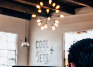 Sit Down. Be Humble. spencer working on graphic